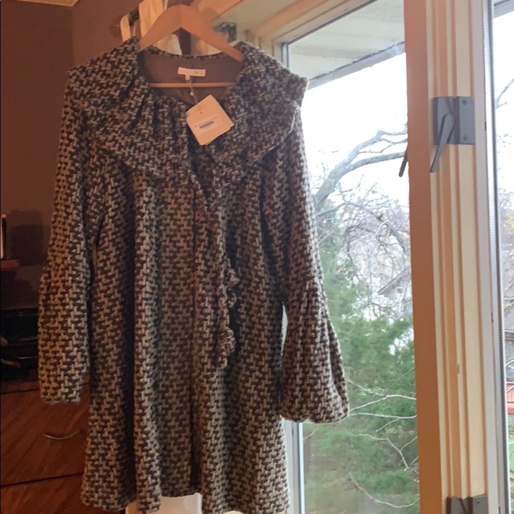 Adorable lined coat from local boutique.